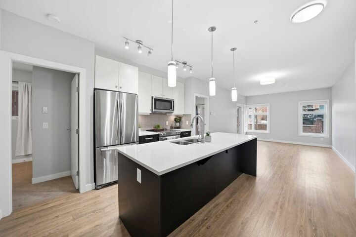 Property Photo:  1720 10 Street SW 107  AB T2T 3E8 