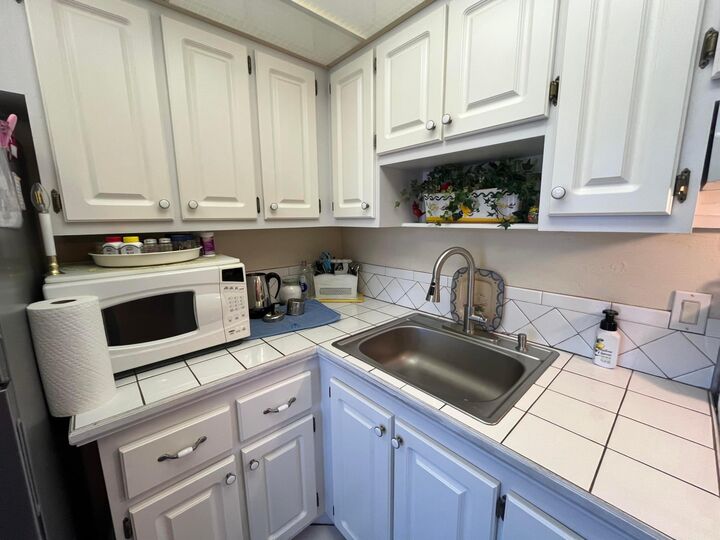 Property Photo:  2191 NE 1st Court 203  FL 33435 
