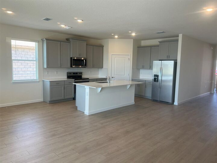 Property Photo:  318 Bracer Way  FL 32174 