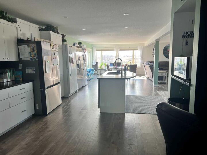 Property Photo:  11409 Black And White Trail 1  AB T1B 0L1 