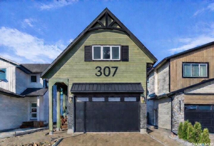 Property Photo: 307 Sharma Crescent SK S7W 1J1