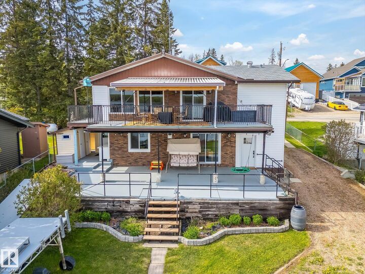 Property Photo: 75 Lakeview Av South View AB T0E 0L0