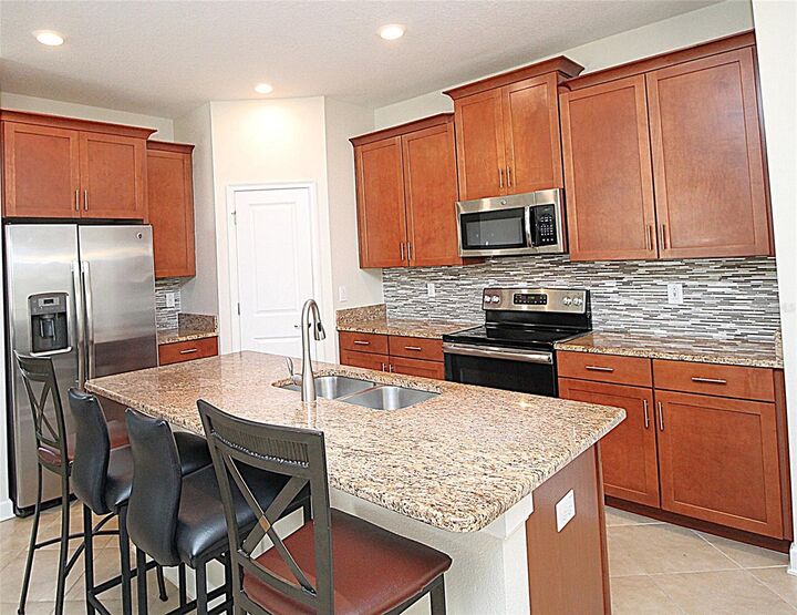 Property Photo:  3752 Quaint Lane  FL 34711 