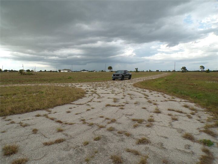 Property Photo: 1 Bobolink Place FL 33946