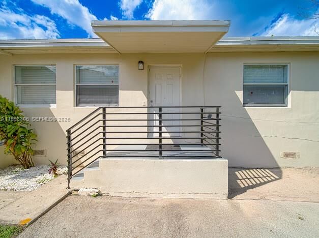 Property Photo:  1887 NW 48th St 1887  FL 33142 