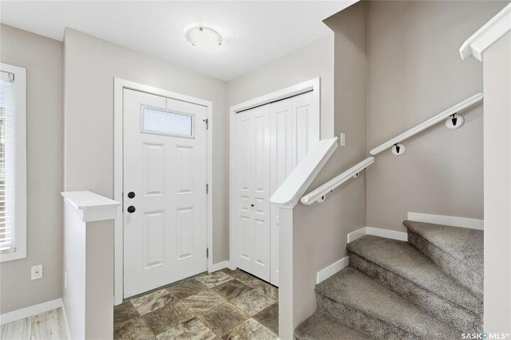 Property Photo: 52-4850 Harbour Landing Drive SK S4W 0K9