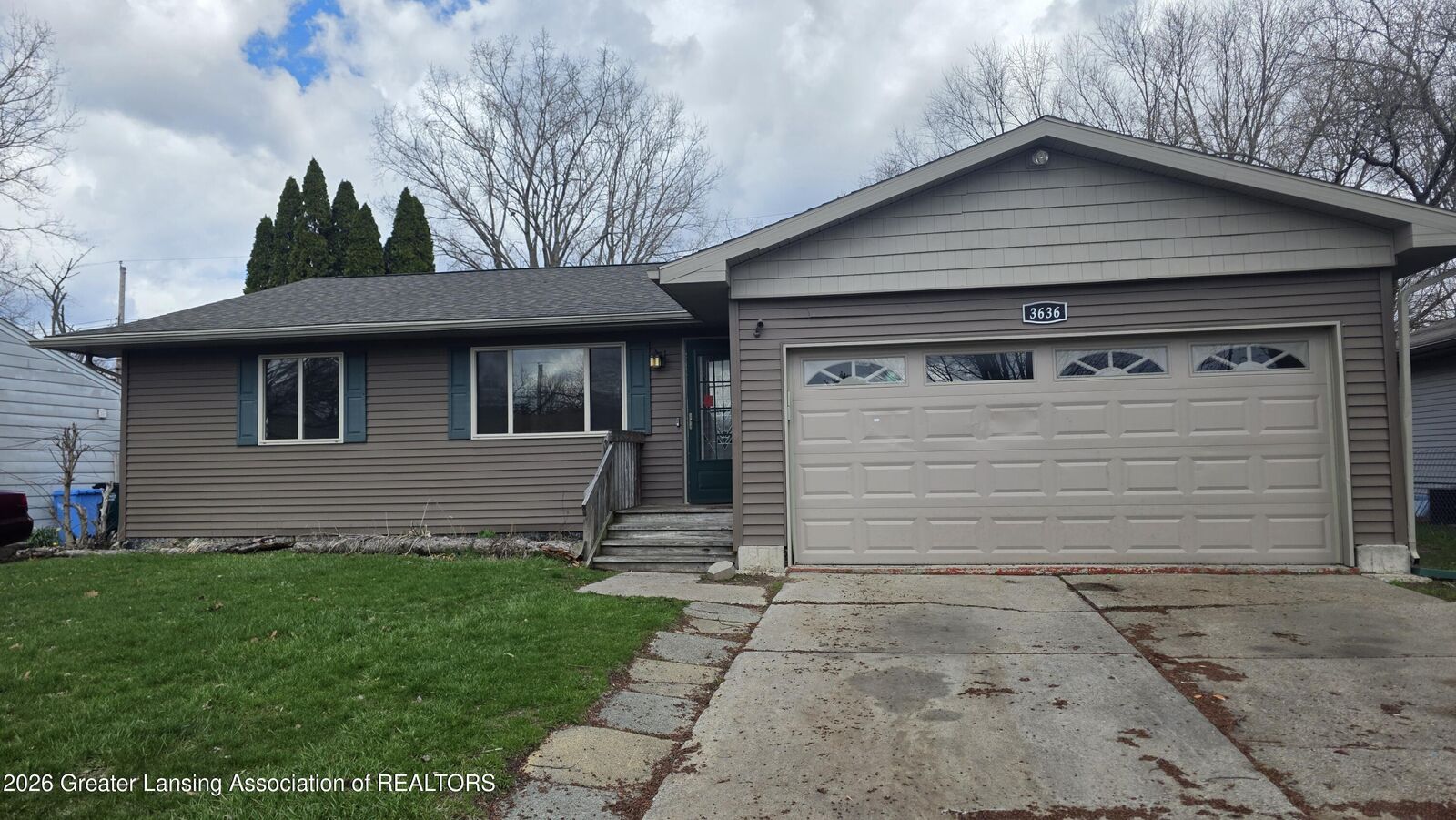 Property Photo:  3636 Coachlight Common Street  MI 48911 