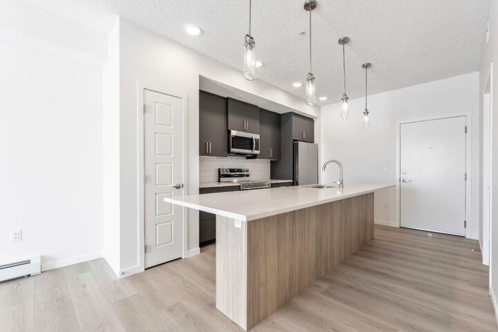Property Photo: 245 Edith Place NW 419 AB T3R 2M7