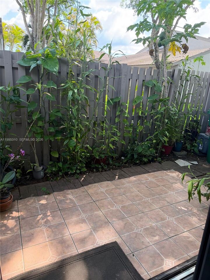 Property Photo:  10669 SW 113th Pl 84W  FL 33176 