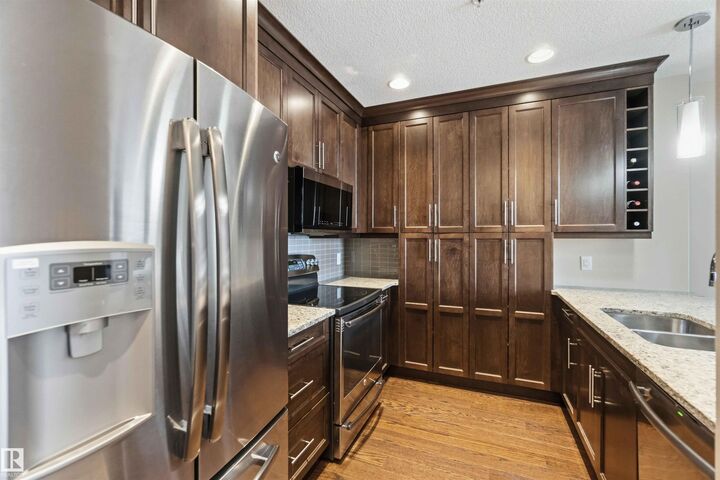 Property Photo: 11080 Ellerslie Road SW 212 AB T6W 2C2