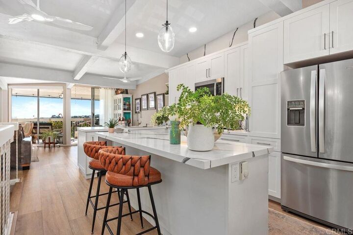 Property Photo:  2327 Caringa Way 3  CA 92009 