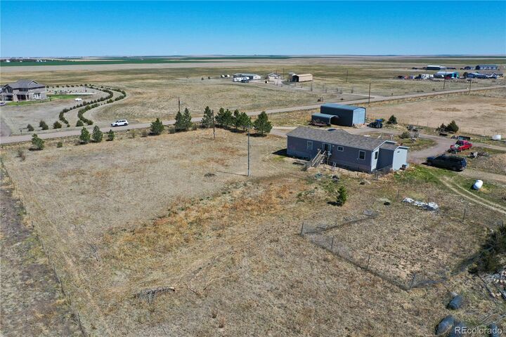 Property Photo:  49800 E 112th Avenue  CO 80102 