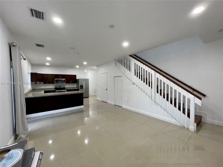 Property Photo:  1531 NW 55th Ter 1533  FL 33142 