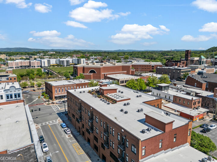Property Photo:  1 E 3rd Avenue 310  GA 30161 