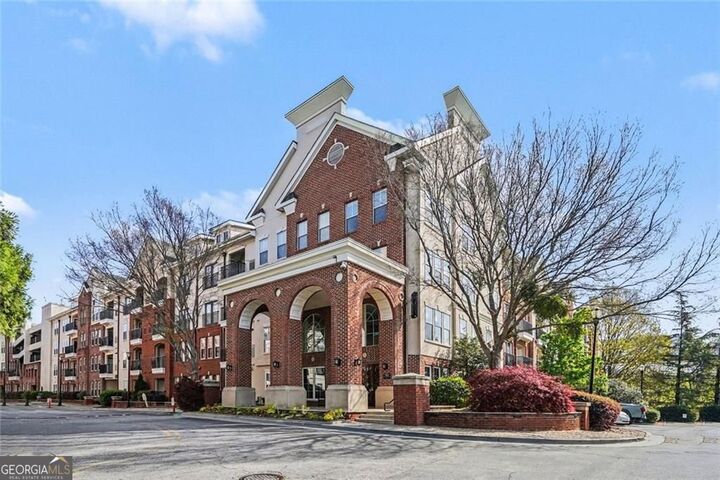Property Photo:  1850 Cotillion Drive 1326  GA 30338 