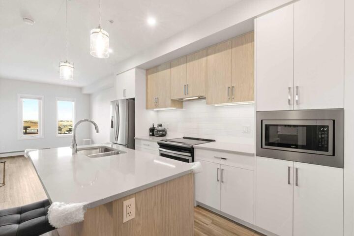 138 Sage Valley Common NW 208 — photo 1
