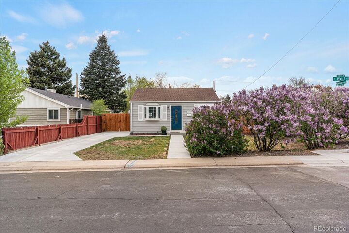 Property Photo:  1301 S Wolff Street  CO 80219 