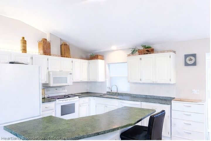 Property Photo:  4108 Garienda Avenue  FL 33872 