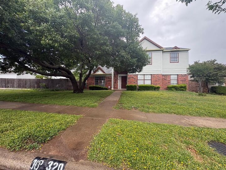 Property Photo: 320 W Williams Street TX 75104