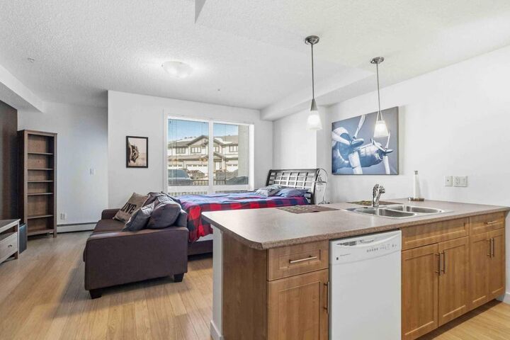 Property Photo:  204 Sparrow Hawk Drive 2117  AB T9K 0P1 