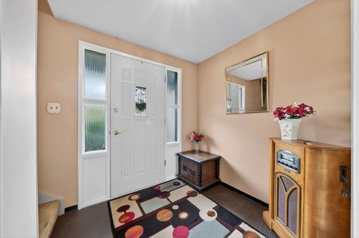 Property Photo:  3833 Killarney Street  BC V3B 3G5 