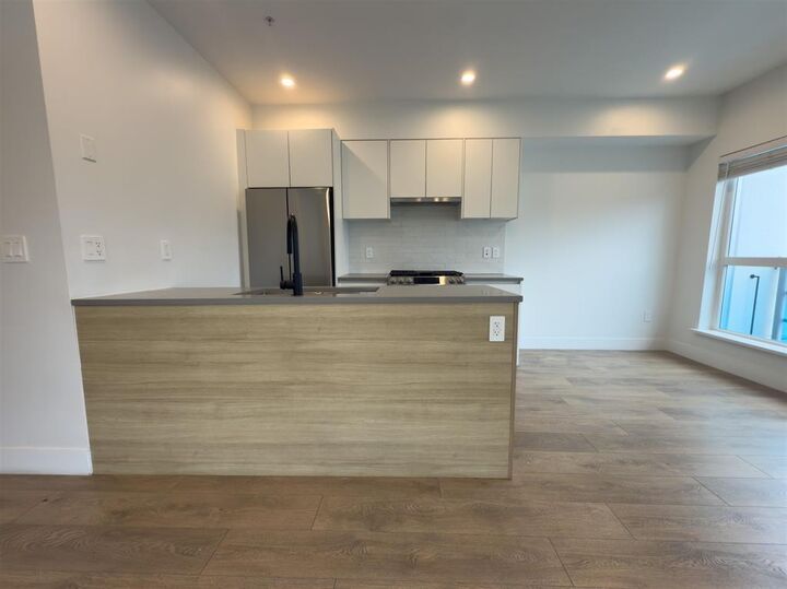 Property Photo:  8496 120 Street 213  BC V3W 3N5 