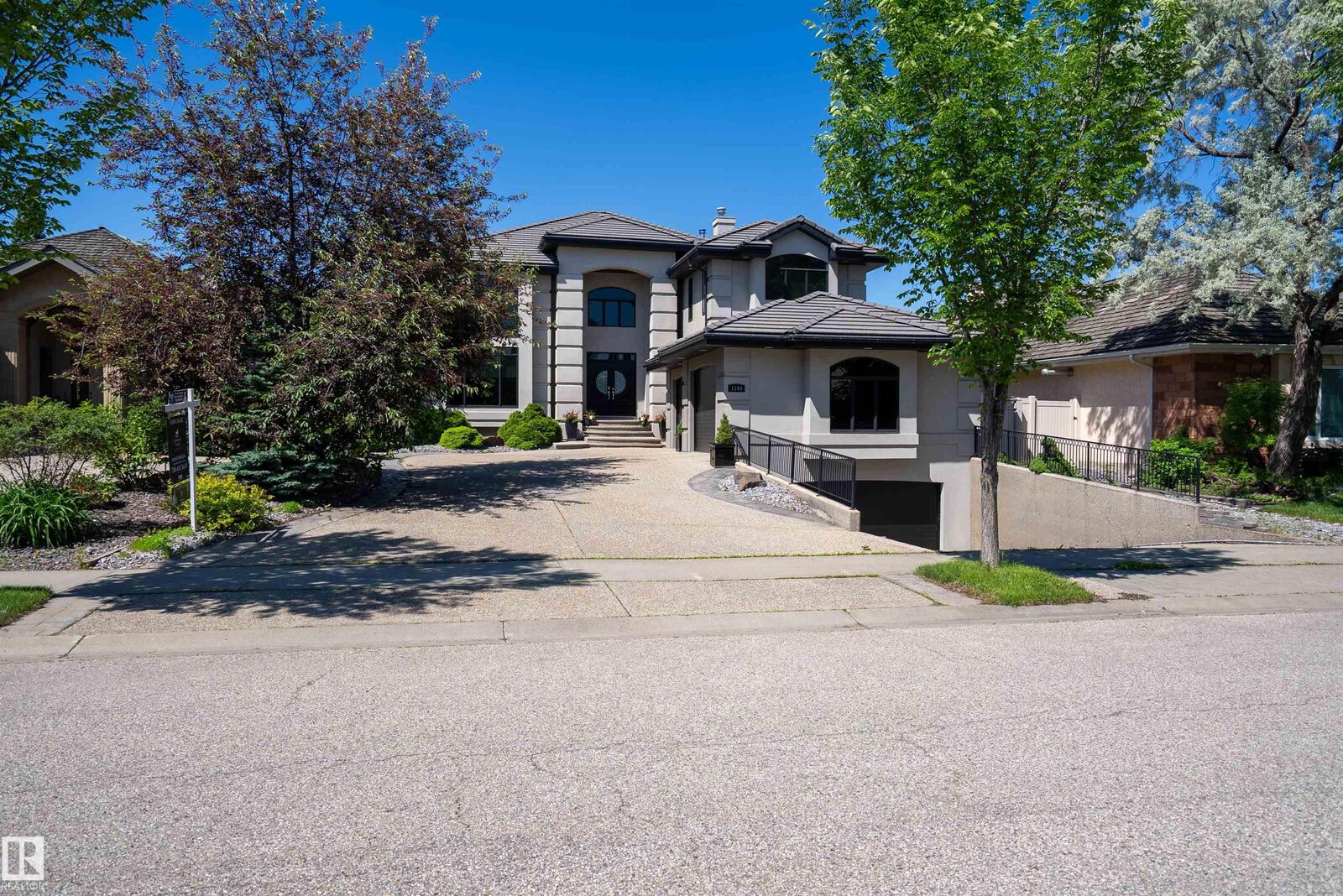 Property Photo: 1144 119 Street NW AB T6J 7H7