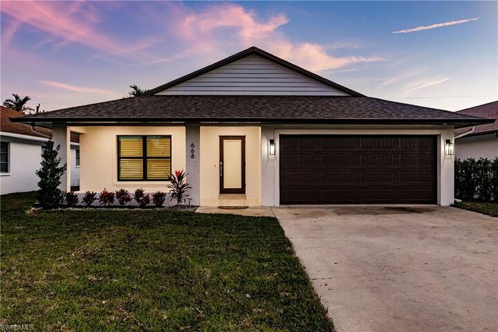 Property Photo: 668 104th Ave N FL 34108