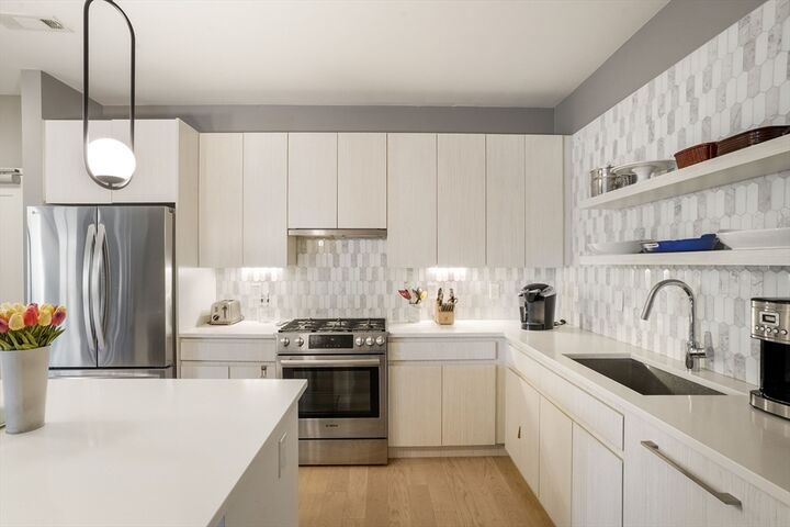 Property Photo:  45 W 3rd St 313  MA 02127 