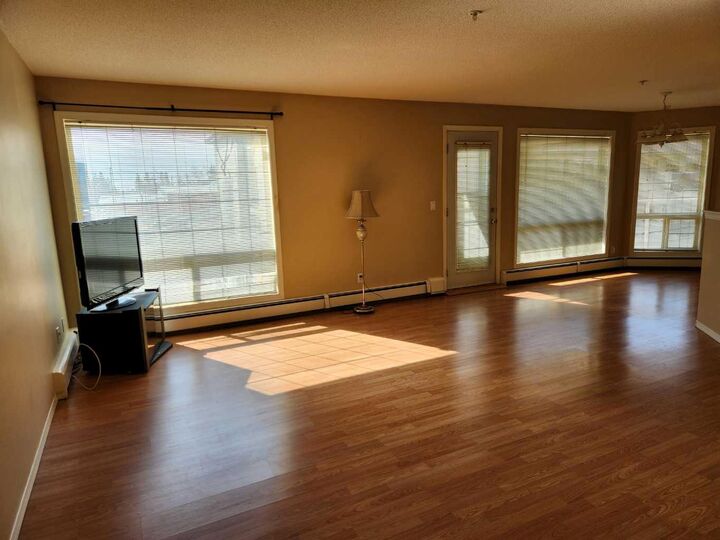 Property Photo:  5117 50 Street #207  AB T9V 0M7 