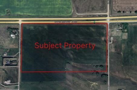 Property Photo: Hwy 22X (Spruce Meadows Trail West) &Amp 128 Street W AB T1S 0W8