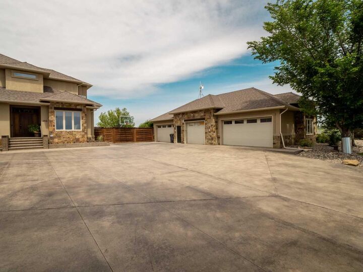 Property Photo:  402 Meadow Lark Drive W  AB T1J 5R8 