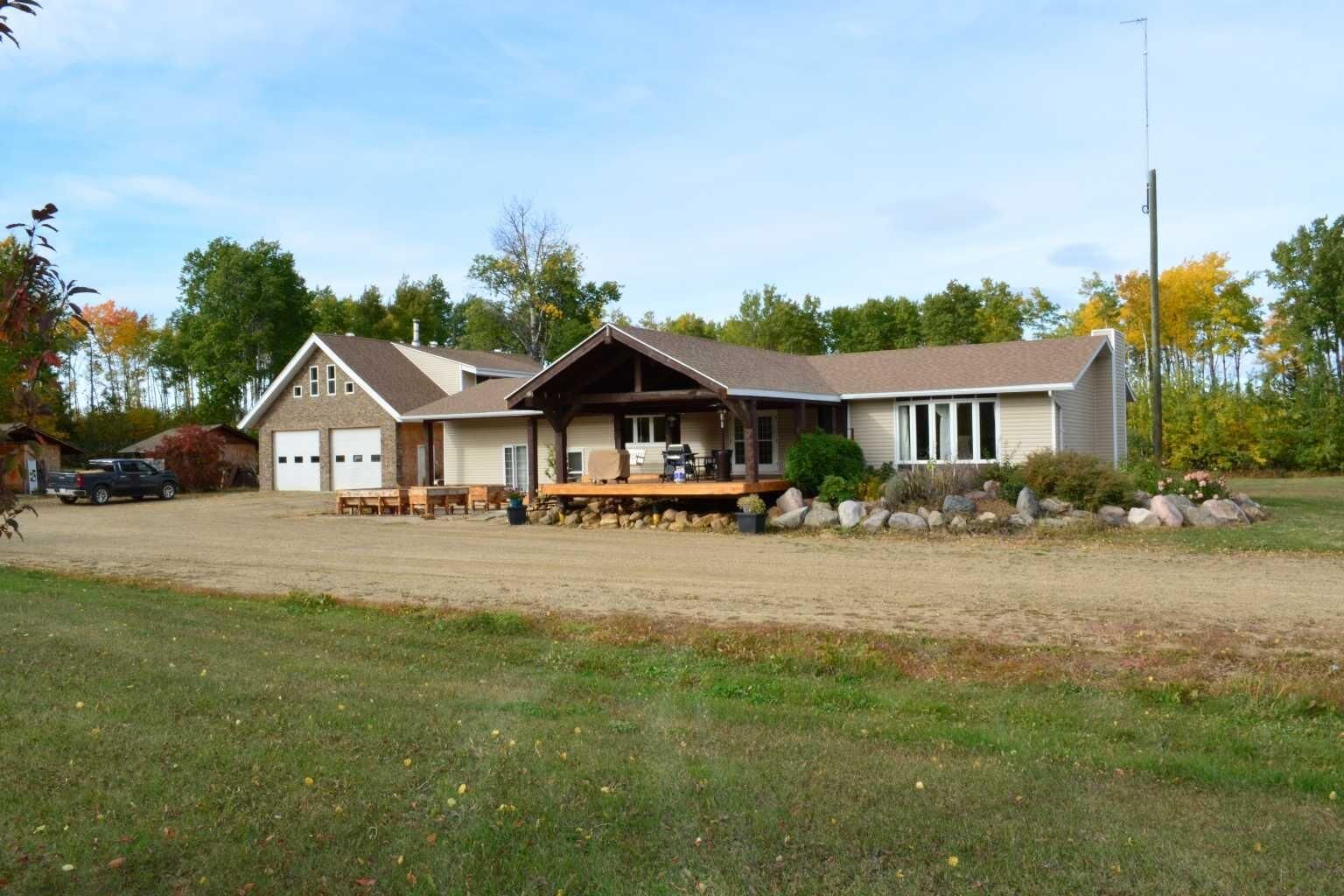Property Photo: 221007 Twp 851A AB T8S 1S4