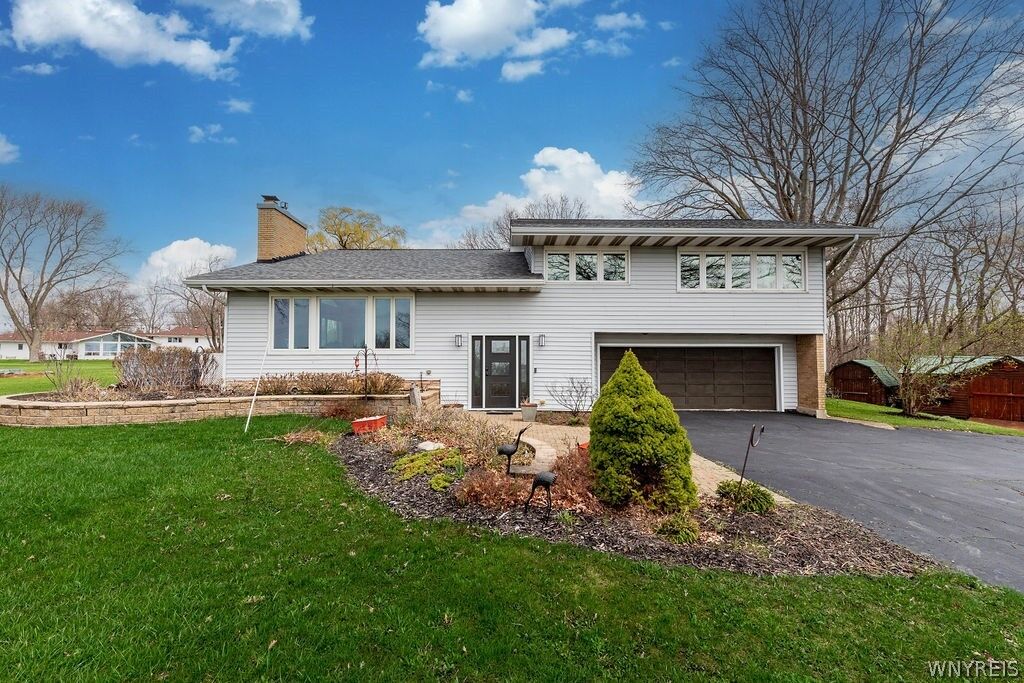 Property Photo:  1255 West River Road  NY 14072 