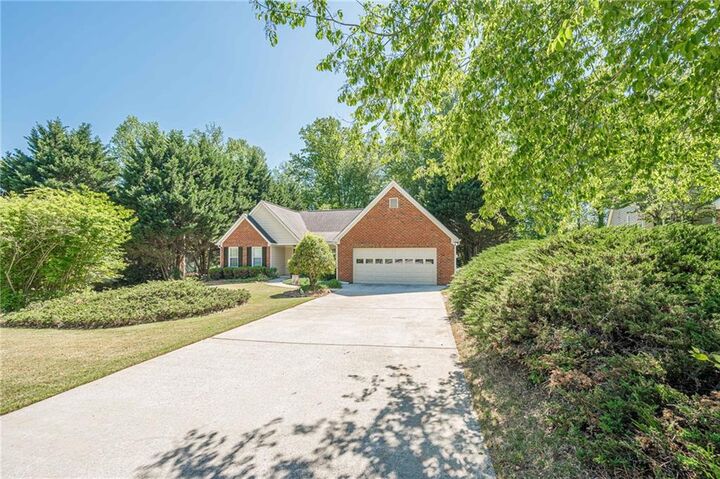 Property Photo:  7730 Timberline Ovlk  GA 30041 