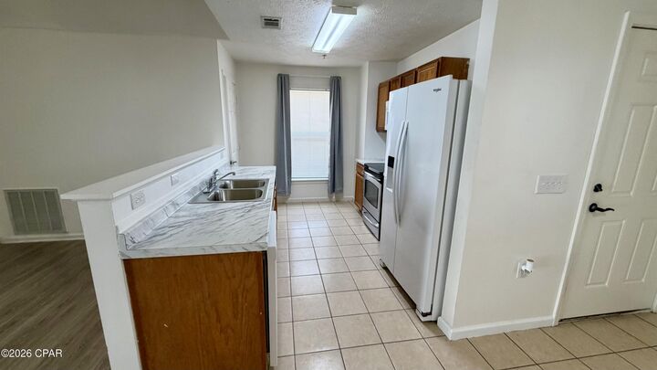 Property Photo:  9117 Laird Street 9125  FL 32408 