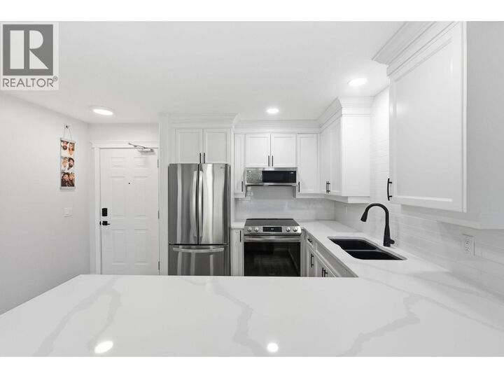 Property Photo: 1965 Pandosy Street 309 BC V1Y 1R9