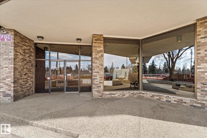 Property Photo: 13910 Stony Plain Road NW 102 AB T5N 3R2