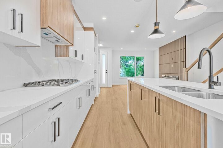 Property Photo: 11138 126 Street NW AB T5M 0P9