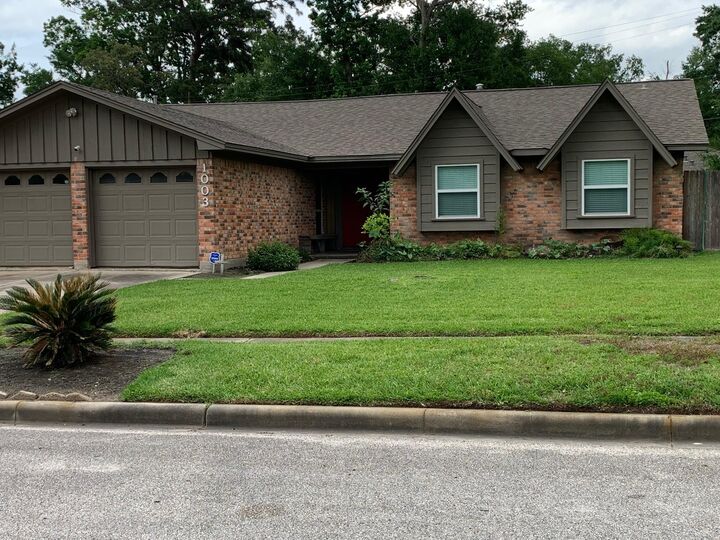Property Photo:  1003 Timber Hill Drive  TX 77301 
