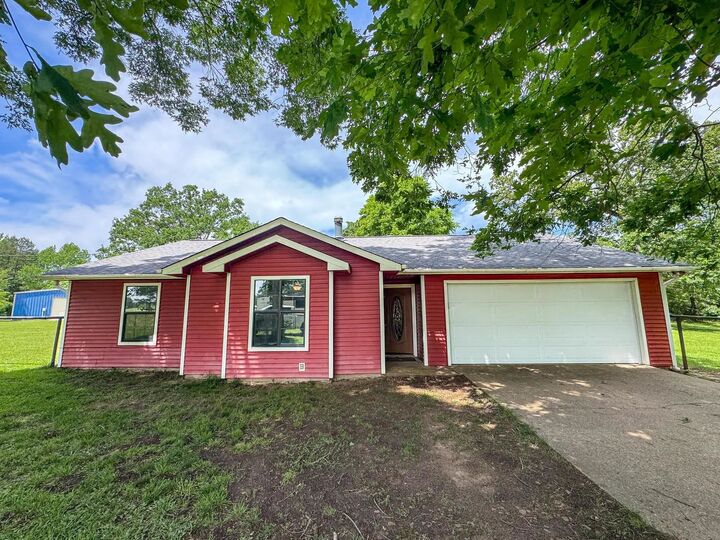 Property Photo:  112 County Road 2128   75551 