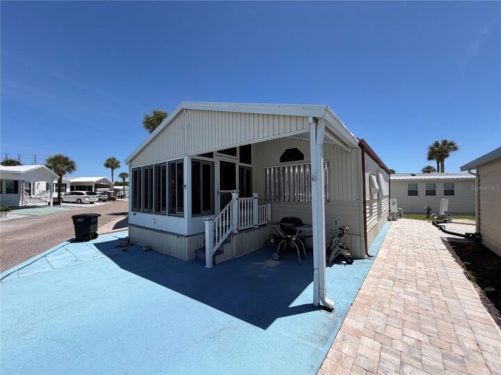 Property Photo:  9000 US Highway 192 650  FL 34714 