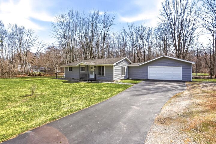 Property Photo:  249 W Miller Road  MI 48640 