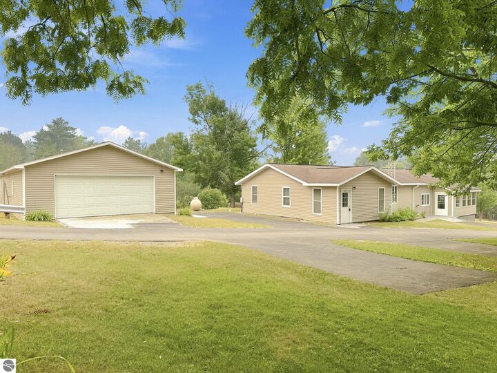 Property Photo: 10976 E 3 Mile Road MI 49656
