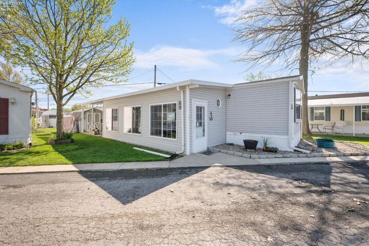 Property Photo:  8175 North Shore Boulevard 64  OH 43440 