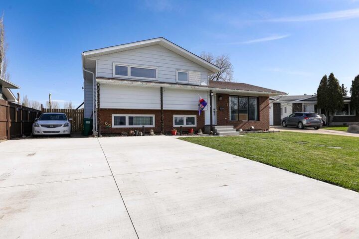 Property Photo: 97 Laval Court W AB T1K 4G2