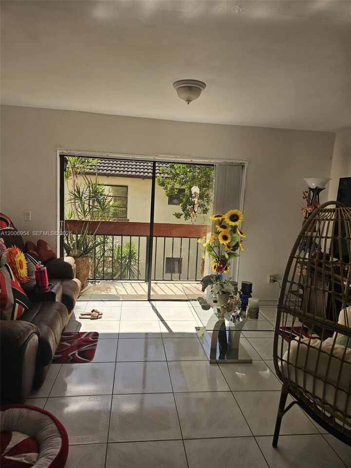 Property Photo:  8620 SW 149th Ave 418  FL 33193 