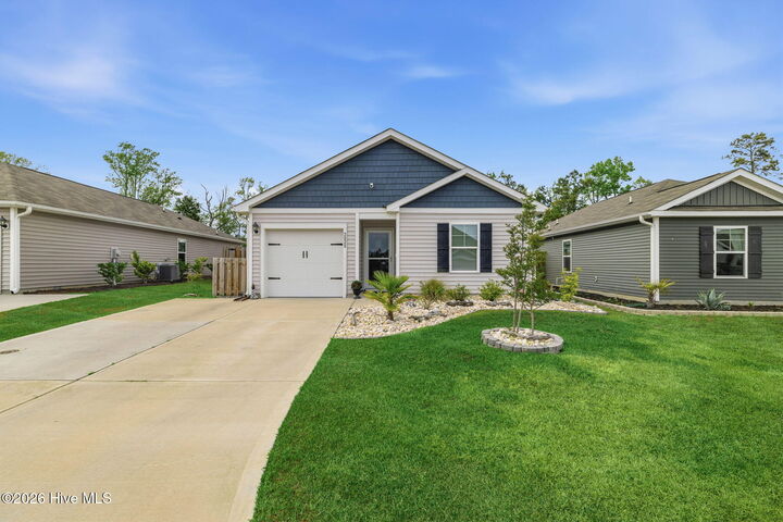 Property Photo:  2028 Course Lane  NC 28445 