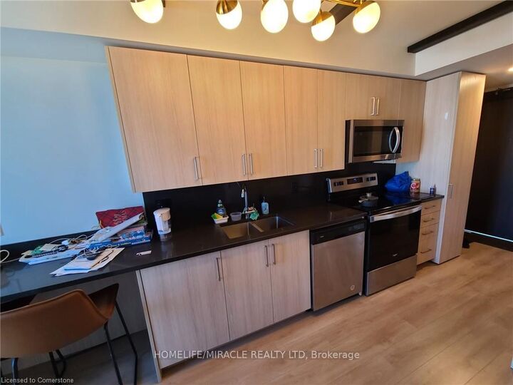 Property Photo: 145 Columbia Street W 725 ON N2L 0K7