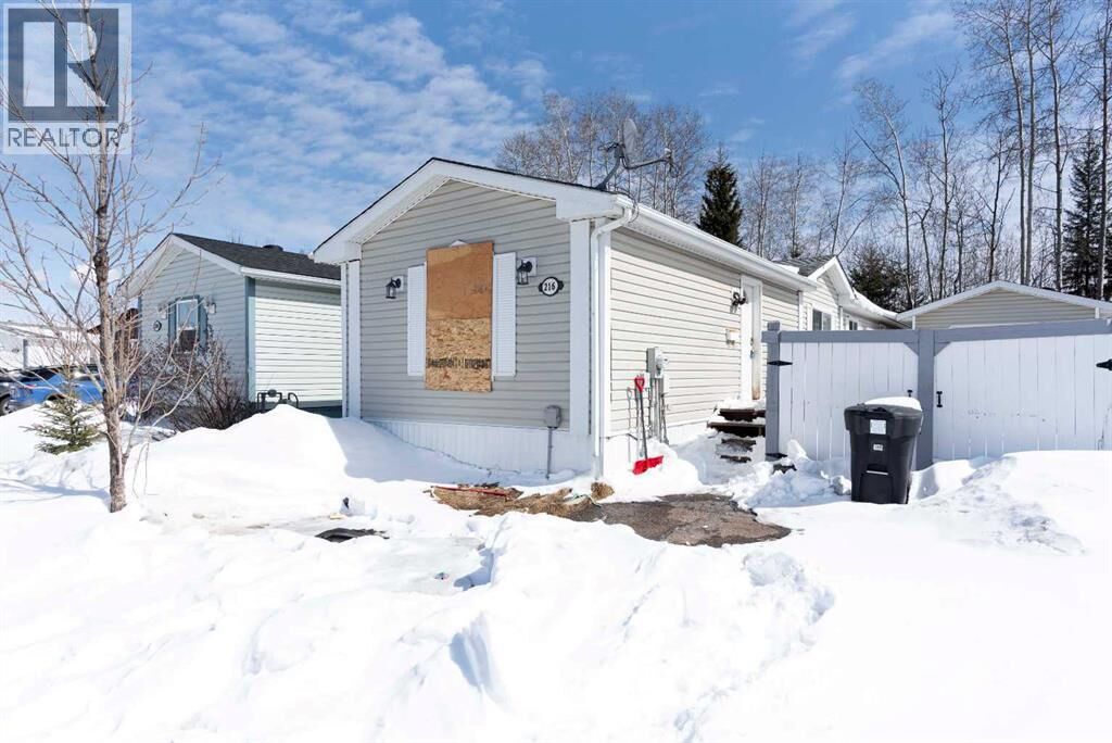 Property Photo:  216 Harpe Way  AB T9K 2K8 